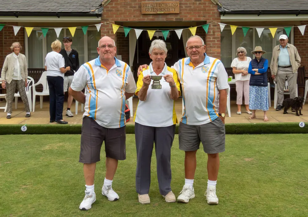 Harrogate bowlers receiving the Elsdon Metcalfe Pairs trophy